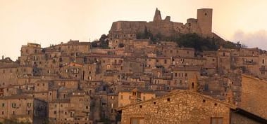 a large stone building with a castle like structure