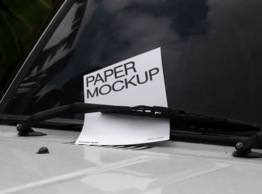 a car with a paper sign on it