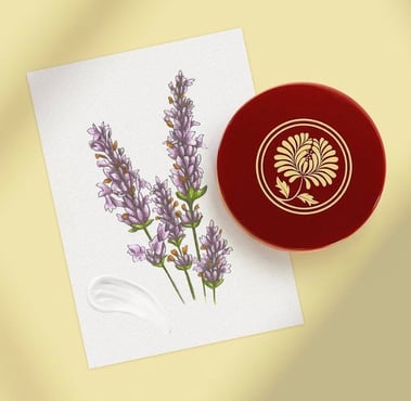 Card featuring an hand-drawn lavender botanical illustration next to a small red round box on a yellow background