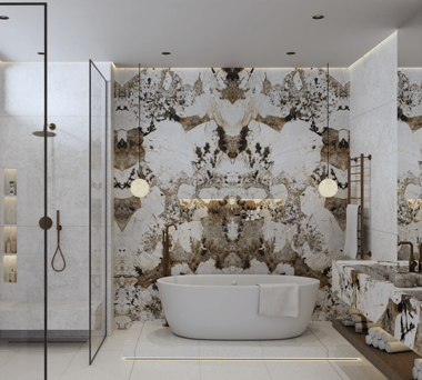 Luxurious bathroom with a white freestanding bathtub against a Patagonia Marble wall.