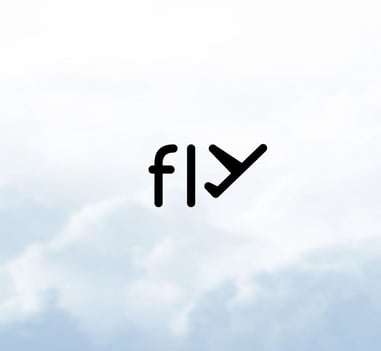 a plane flying through the sky with a plane in the background