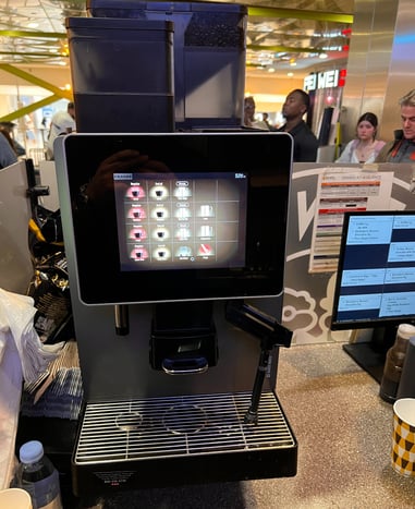 Franke espresso machine brewing coffee at a commercial food service location in South Florida