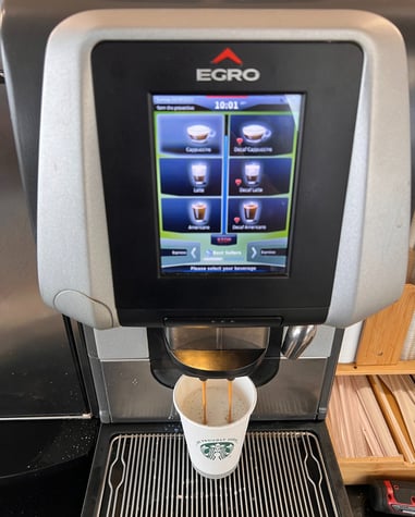 Egro One Touch espresso machine preparing a coffee beverage in South Florida