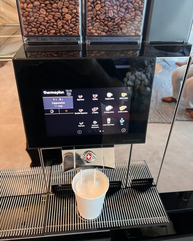 Thermoplan Black&White4c coffee machine serving a cappuccino in South Florida