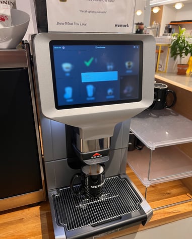 Egro NEXT espresso machine brewing Americano at a WeWork location
