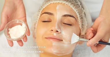 a woman getting a facial mask with a brush