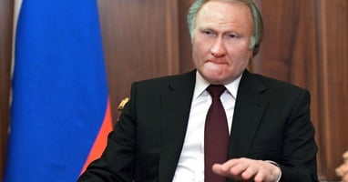 Vladimir Putin with the hair of former football manager Ron Atkinson