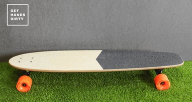 Longboard made of baltic plywood. Orange rollers.