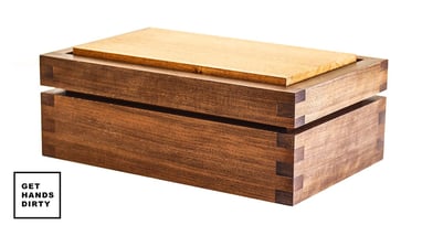 A box made out of walnut and agba wood.