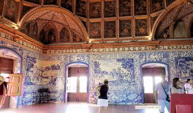 blue ceramic tiles showing hunting scenes in the Heraldic room of Sintra National Palace