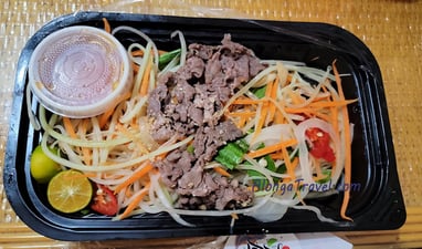 Packed Asian salad with some meat included sold in airports keeps you more energized & healthier 