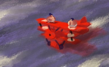 a red airplane with two people on it
