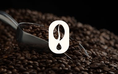 a coffee brand logo against a backdrop of coffee beans