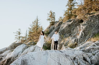 Light house park Engagement photos couple holding hands