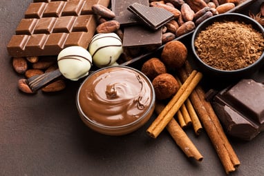 Assorted mixed chocolates. Chocolate bars, cocoa nibs, powdered cocoa, spreads, bon bons, truffles,