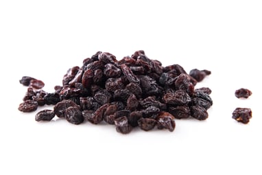 A pile of black raisins