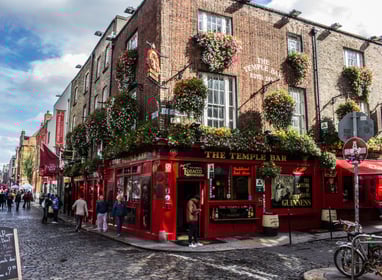 Red iconic The Temple Bar in Dublin, one of the cheapest cities in Europe to fly into from the US