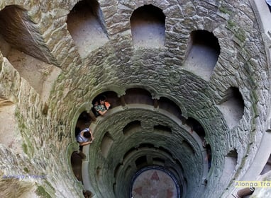 Greenish masonry round staircase of Quinta da Regaleira, that was built on King Dinis I land 