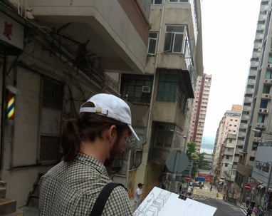 City sketcher Evgeny Bondarenko in Hong Kong