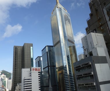 a city skyline with skyscrapers and tall buildings