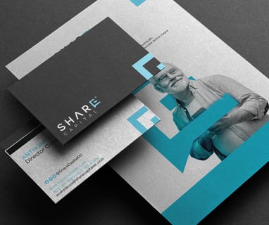 a business card with a business card holder realtor brand