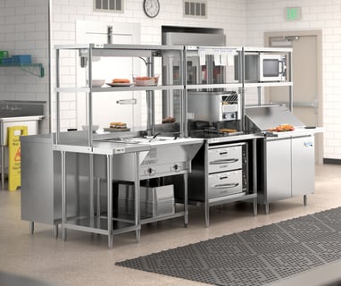 a kitchen with a large counter top and a clock on the wall