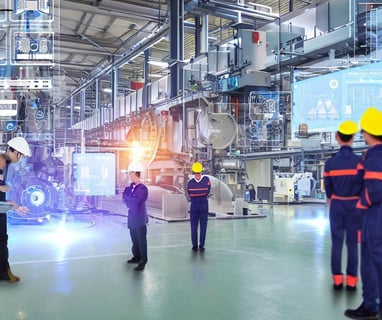 Engineers operating automation systems in a factory