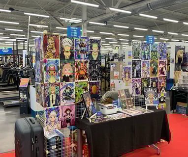 Stand marchés de noël decathlon metz 2022, stand petite plume illustrations manga