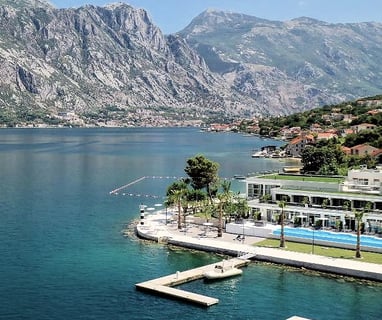 Blue Kotor Bay Premium Spa Resort, surrounded by the turquoise water of Kotor Bay