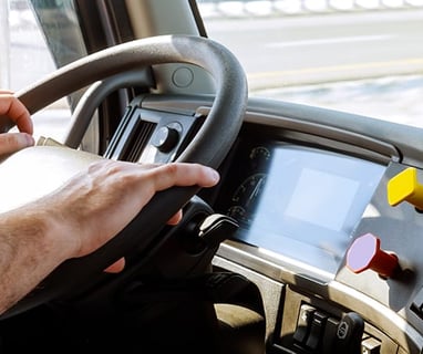 truck driver holding steering wheel