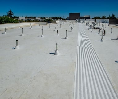 a roof top with a lot of poles and poles