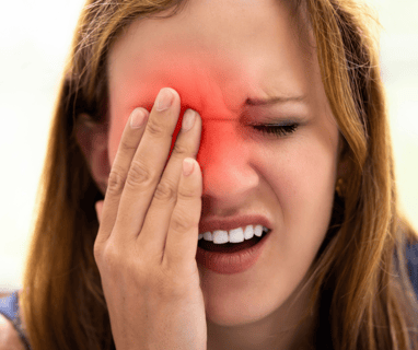 a woman with a red eye, indicating a problem 