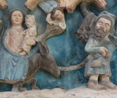 Mary and Joseph fleeing from Herod.