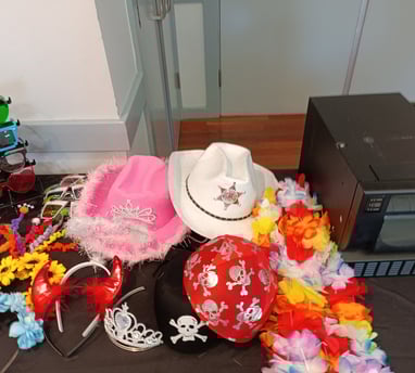 a table with hats and props