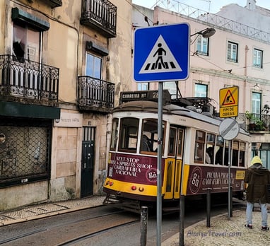 Tram 28 on the streets of the most fun neighborhoods riding on a narrow steep street