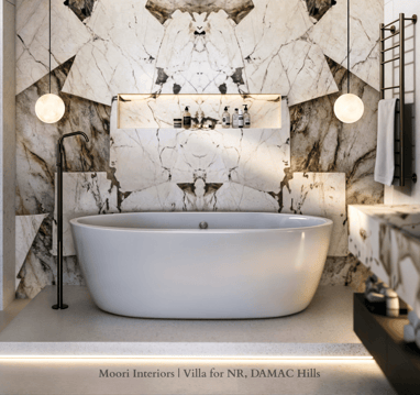 Bathroom with a modern black floor-mounted faucet and pendant lighting above a white tub.