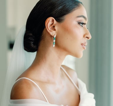 Zahra Omarji's sleek bun bridal hairstyle