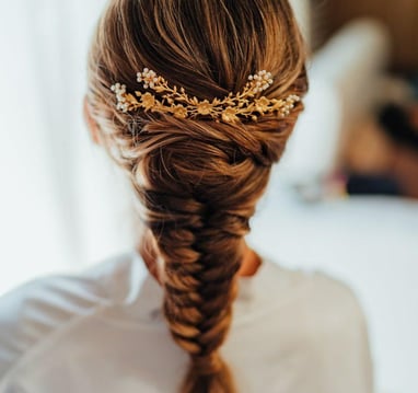 Bride with braided hair in Rio do Prado wedding venue by Memorelle Weddings