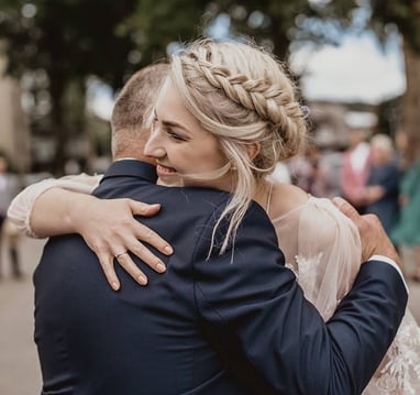 beautiful blonde bride with braided hairstyle