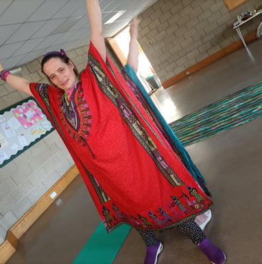 A woman performing creative movements