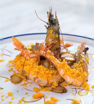 a plate of food with shrimp and shrimp