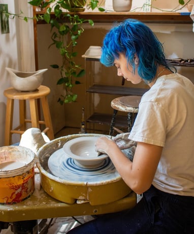 Our resident Starkie throwing a bowl on the ceramic wheel.