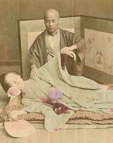 Séance de Shiatsu sur futon (photo historique Japon)