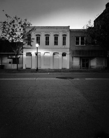 a street light in front of a building