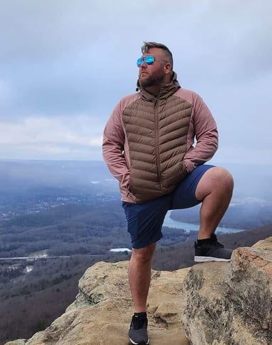 a man standing on a rock