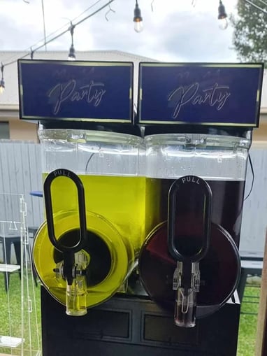 Slushie machine setup in Redlands for Tori and Ashton's joint birthday party.
