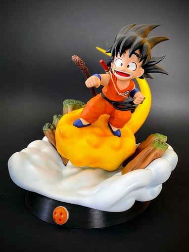 figurine en résine de goku dans dragon ball sur son nuage peinte à la main