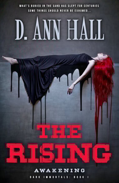 a woman laying on a bed with blood dripping from her head