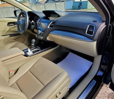 Interior Detailing Image “Deep interior car detailing with steam cleaning and vacuuming of seats"