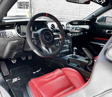 Interior Detailing Image “Deep interior car detailing with steam cleaning and vacuuming of seats"